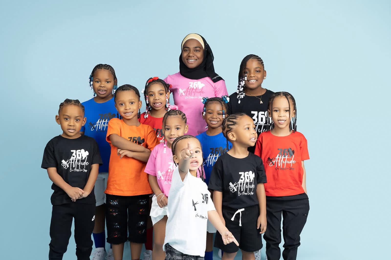 Children learning and creating together in a supervised youth activity space